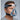 Man wearing a Philips Respironics ComfortGel full face CPAP mask with blue gel cushion and headgear, shown at an angle.